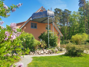 Ferienwohnung am Wald FeWo 02 Terrasse, Gartennutzung, Saunanutzung in Glowe